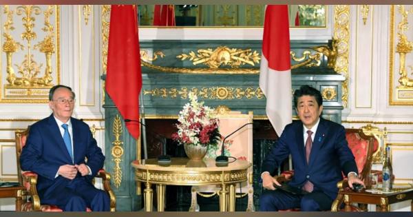 首相、香港情勢で平和解決を要請　中国副主席と会談