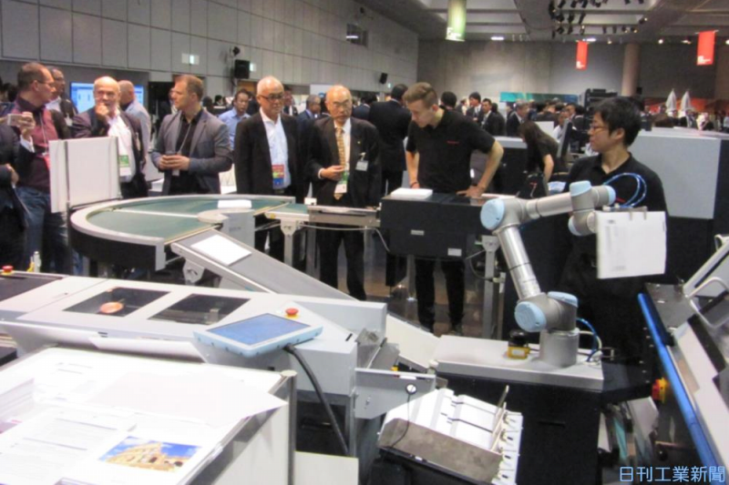 製本まで機械とロボットが一貫作業する印刷工場が注目されるワケ