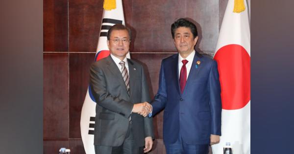 日韓首脳が1年強ぶりに会談、関係改善の必要性を強調