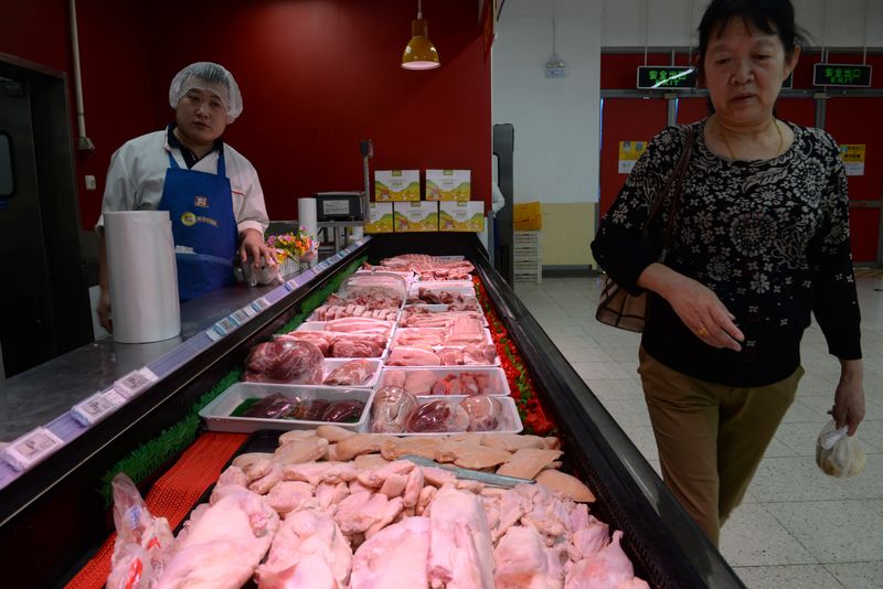 中国ＰＰＩ、12月は下げ和らぐ　ＣＰＩは豚肉高騰で8年ぶり大幅上昇