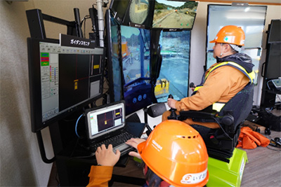 KDDI、大林組、NECが連携し、5Gを活用した一連の道路造成工事の実証に成功