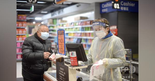 中国、ウイルス拡散防止で使用済み紙幣を消毒 最長2週間の隔離も