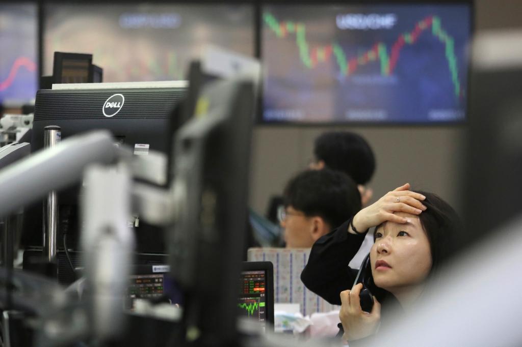 韓国株急落に危険な勝負の個人投資家　人生逆転狙う「東学個人運動」