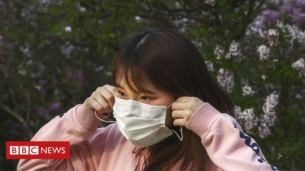 China records no new virus deaths for first time