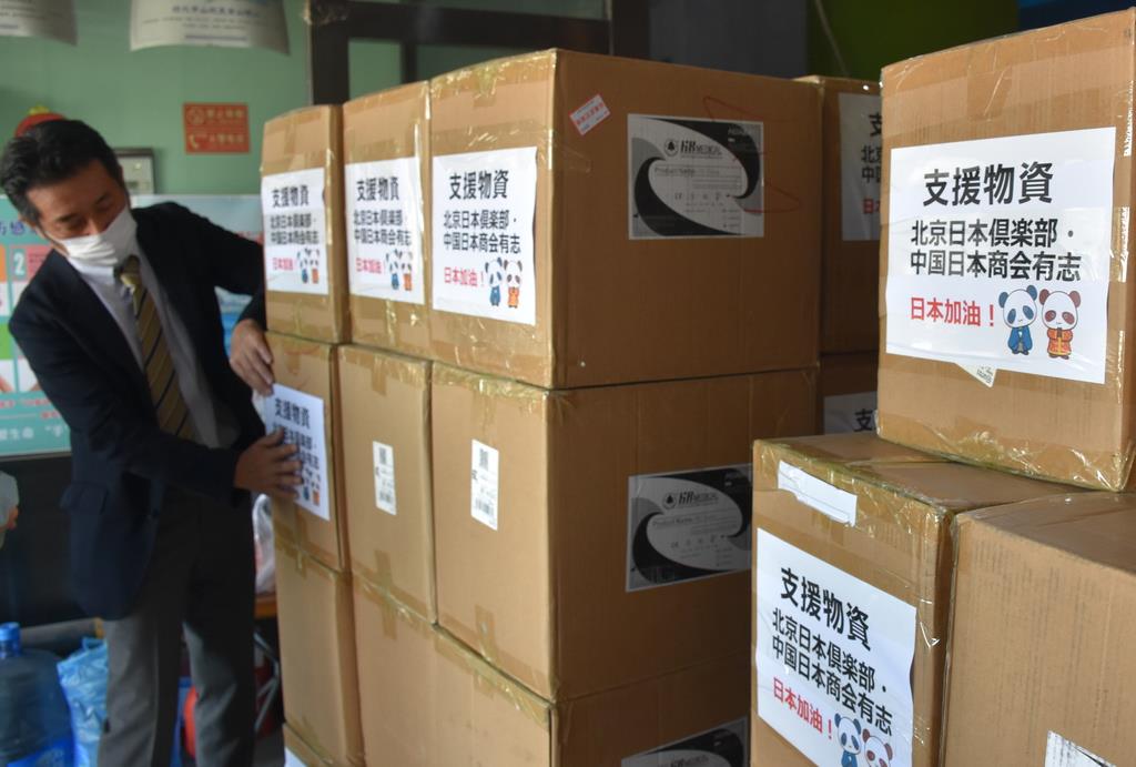 北京の邦人が日本に医療用ガウンを寄贈