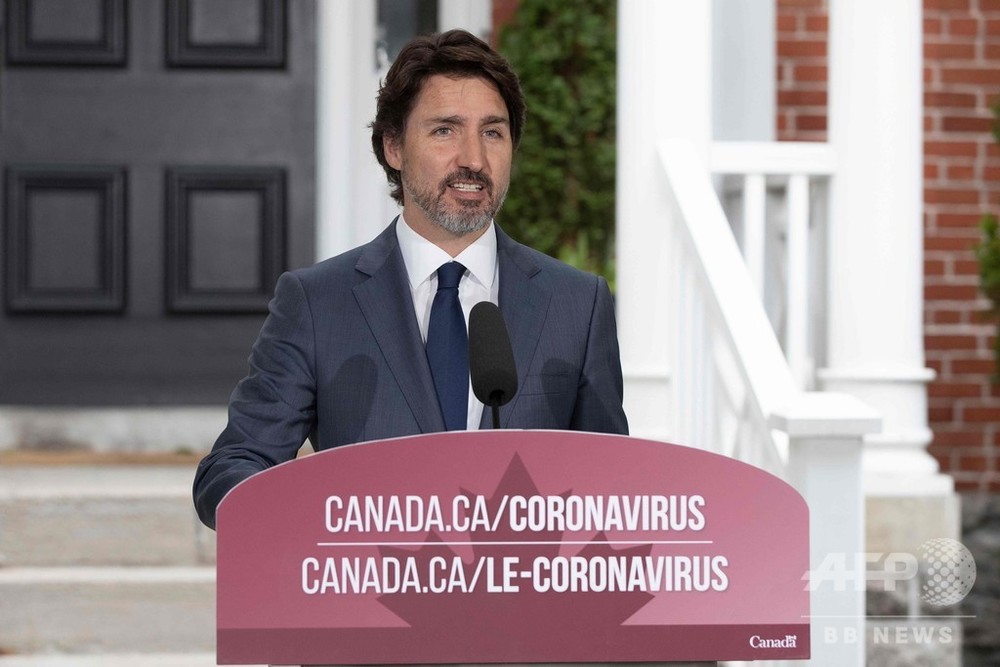 カナダ首相、ファーウェイ幹部と中国拘束のカナダ人2人の交換拒否