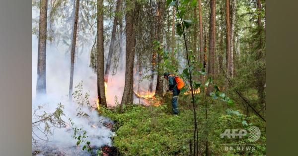 ロシア・シベリア、森林火災の煙が町覆う