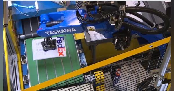 FedExはロボットアームを使ってメンフィスの施設で荷物の仕分けを行う