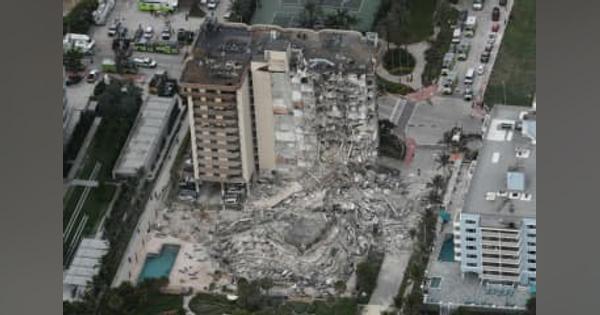 居住者99人と連絡取れず　米でマンション崩落、1人死亡