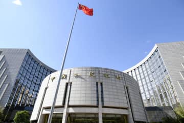 中国人民銀、預金準備率引き下げ　原料価格高騰で企業支援