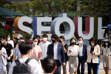 韓国で感染者増、初の3千人台　連日最多更新、新型コロナ