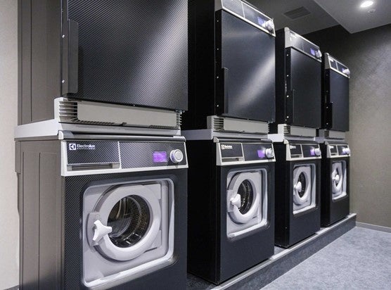 星野リゾートが洗剤レス・キャッシュレスのスマートランドリー導入、wash-plusと開発