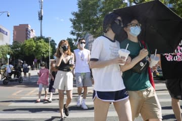 北京、学校や店内飲食再開へ　感染者減少で制限緩和