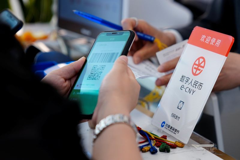 中国、デジタル人民元の利用で個人情報保護を約束