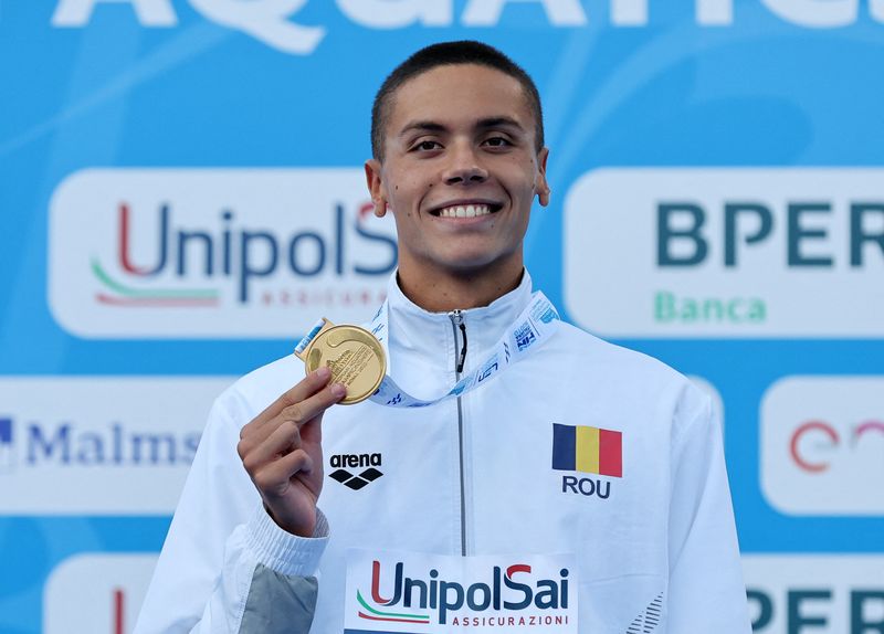 競泳＝ルーマニアのポポビシ、男子100ｍ自由形の世界記録更新