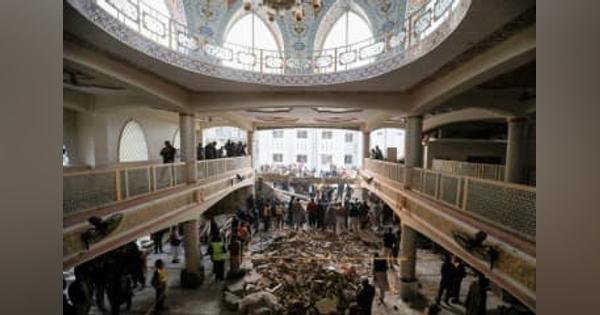 モスク自爆テロの死者95人に　パキスタン、建物崩落