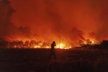 ギリシャ山火事18人死亡　国境地帯、移民か