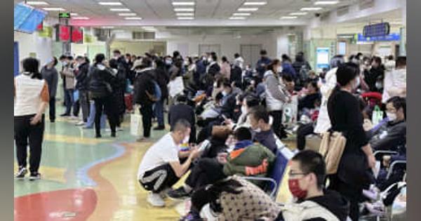 中国、流行中心はインフルエンザ　通常の呼吸器疾患と主張