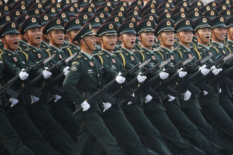 中国、24年国防費は7.2％増　台湾統一巡り「平和的」の文言削除