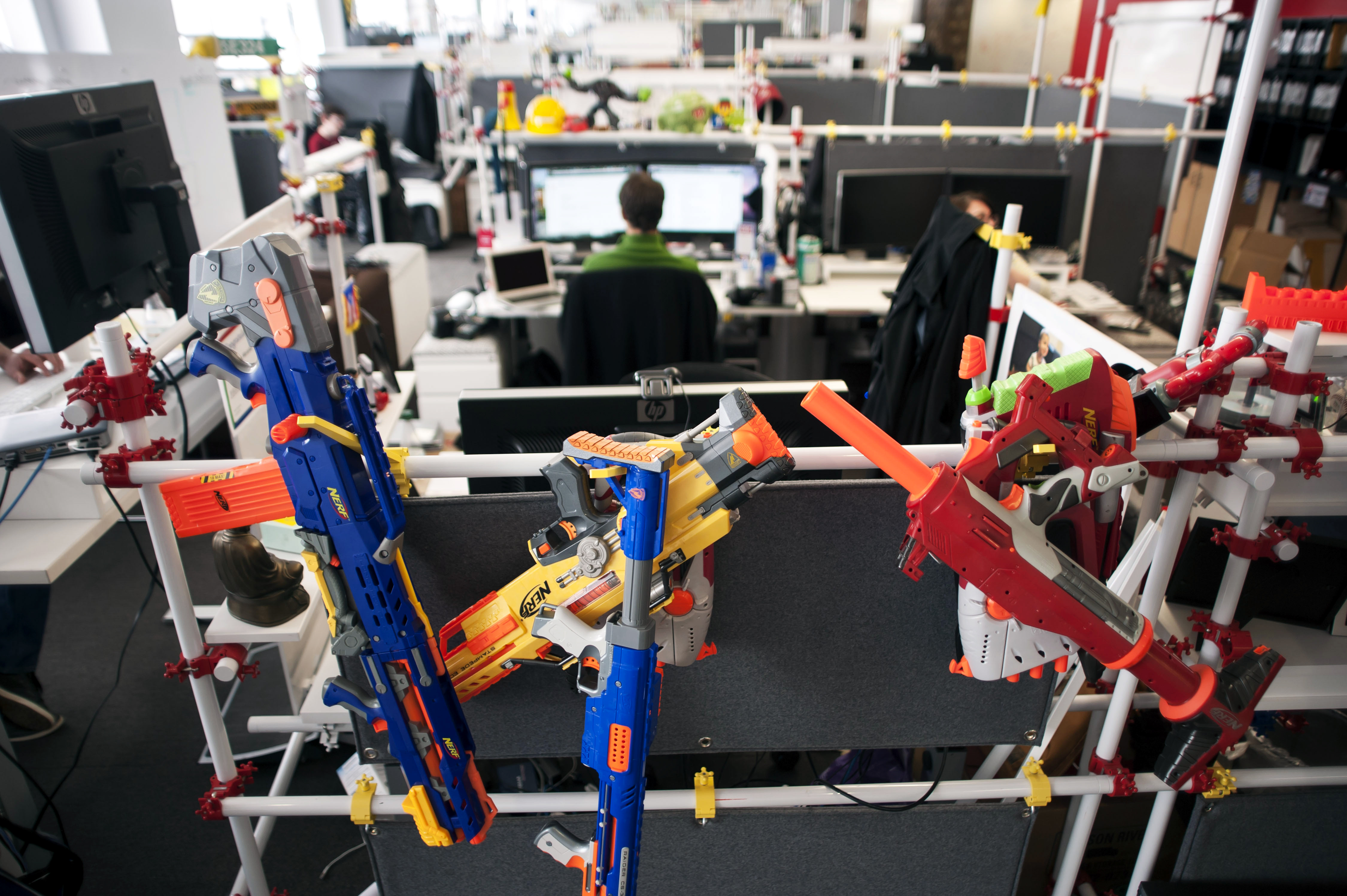 Nerf guns hang from an office partition at Google’s offices in New York.