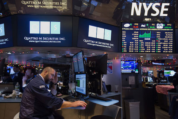 Traders On The Floor Of The NYSE React To Federal Open Market Committee (FOMC) Announcement